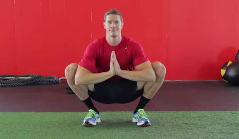 2. Deep Squat Hip Stretch ("Saigon Prayer Squat")