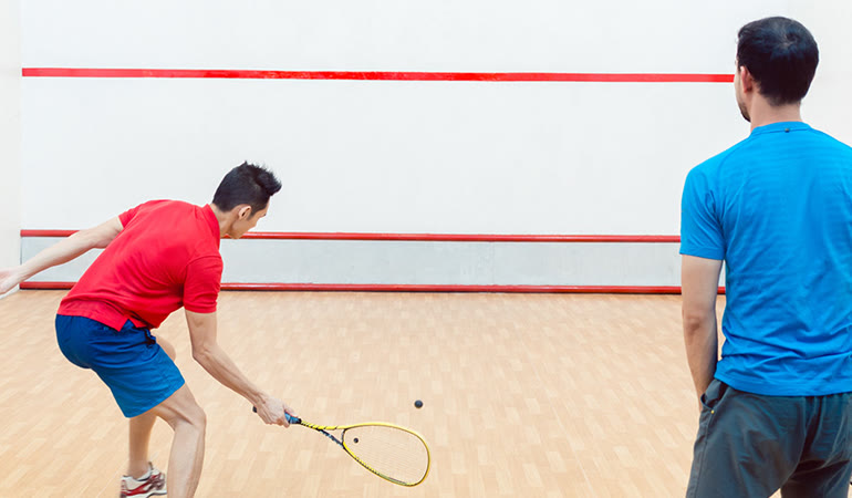 Squash court match at Grafton Tennis and Squash Club, Balham